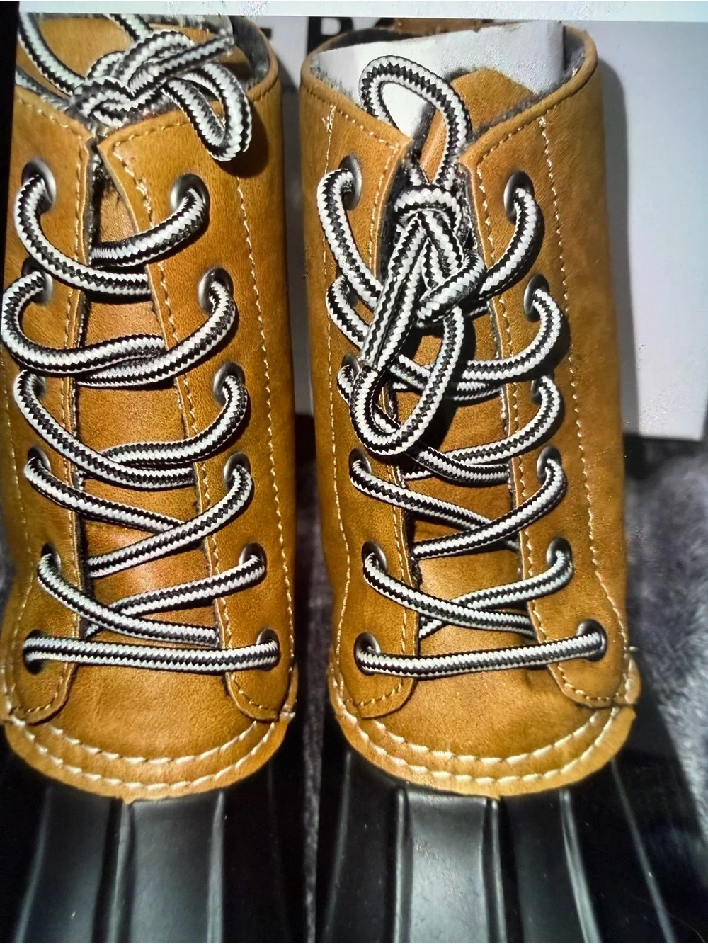 Report Tan and Black Lace-Up Duck Boots
